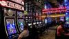 general-view-people-gambling-slot-machines-aspect-ratio-16-9